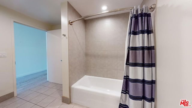 bathroom featuring shower / tub combo and tile patterned floors