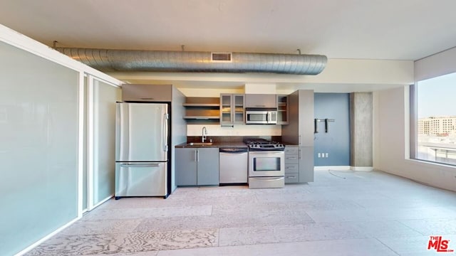 kitchen featuring stainless steel appliances and sink