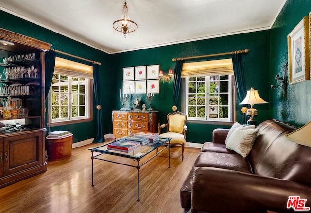 living room featuring wood-type flooring and a chandelier