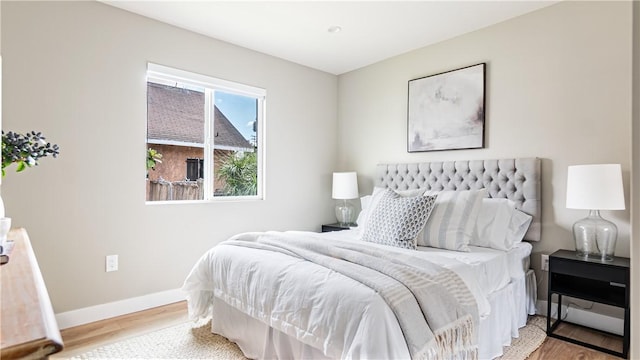 bedroom featuring hardwood / wood-style floors