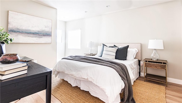 bedroom featuring hardwood / wood-style flooring