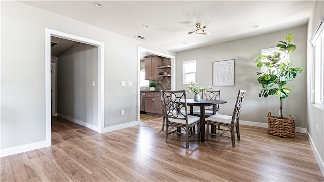 dining room featuring light hardwood / wood-style floors