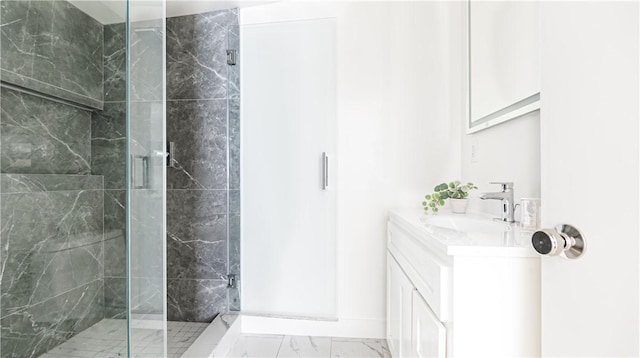 bathroom with vanity and walk in shower