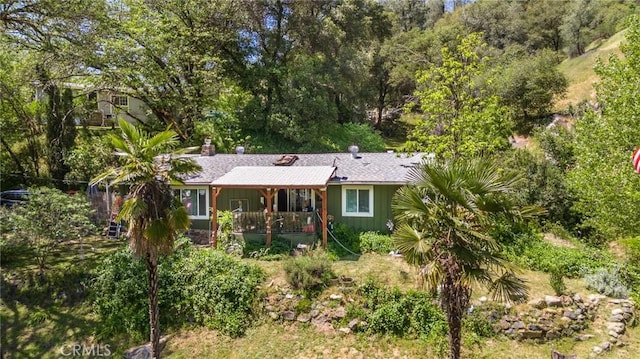 ranch-style home featuring covered porch