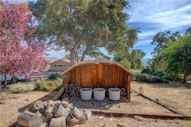 view of yard with a garage