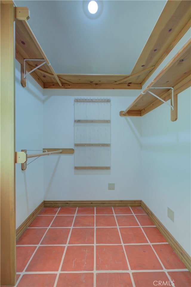 walk in closet featuring tile patterned floors