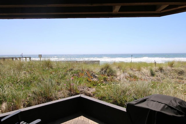 exterior space featuring a beach view