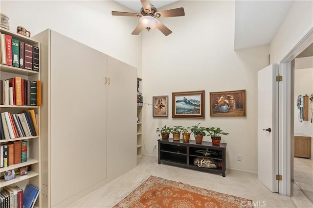 corridor with lofted ceiling and light colored carpet