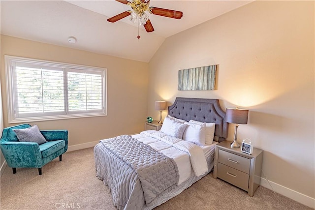 bedroom with ceiling fan, light carpet, and lofted ceiling