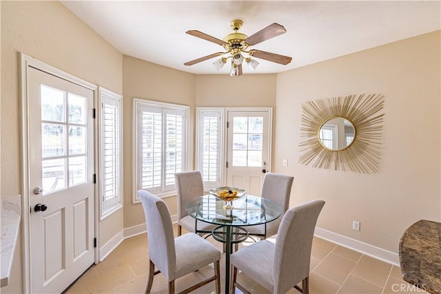 dining area with ceiling fan