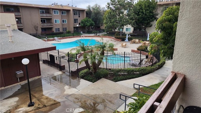 view of pool featuring a patio area