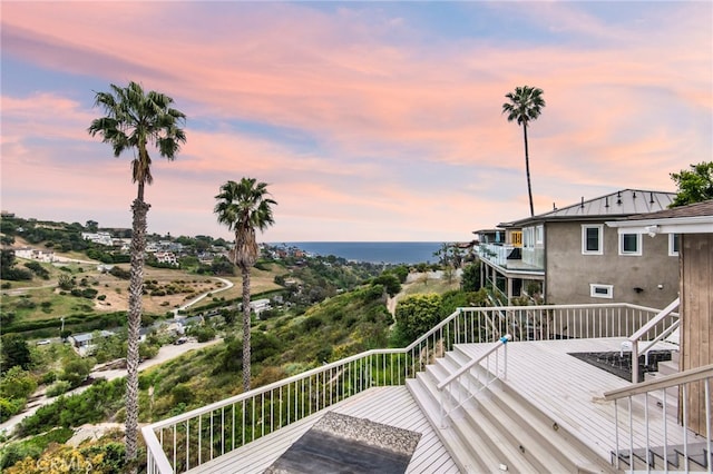 deck at dusk with a water view