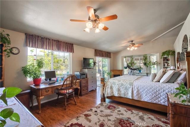 bedroom featuring ceiling fan, lofted ceiling, and dark wood-type flooring