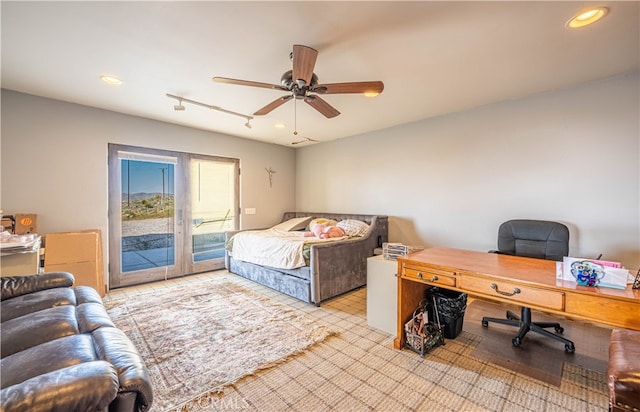 bedroom with ceiling fan and access to exterior