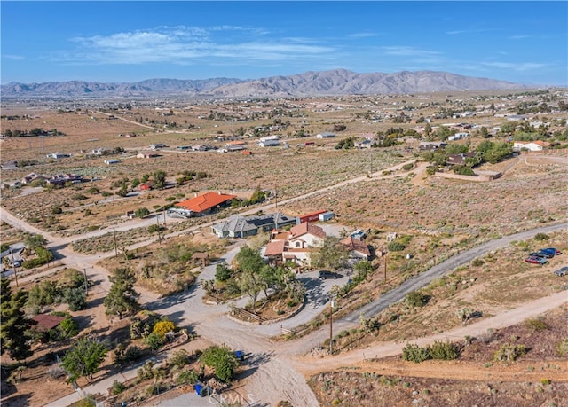 drone / aerial view featuring a mountain view