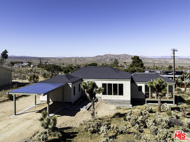 view of front of home with a mountain view