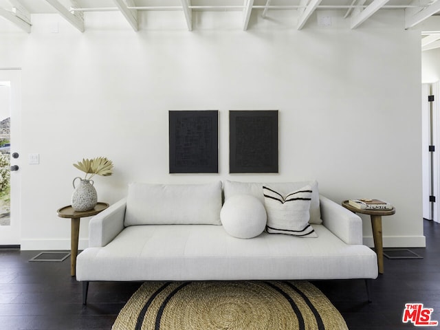 living room featuring dark hardwood / wood-style floors