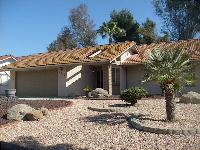 single story home with a garage