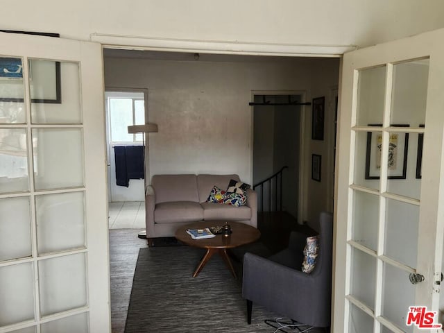 living room with dark wood-type flooring