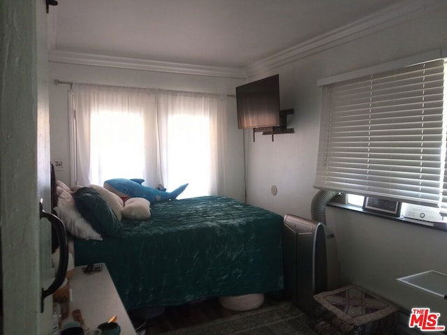 bedroom featuring ornamental molding