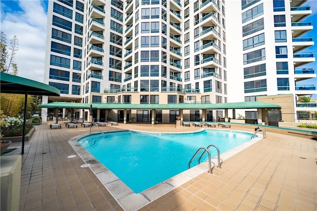 view of pool featuring a patio