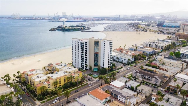 aerial view featuring a water view and a view of the beach