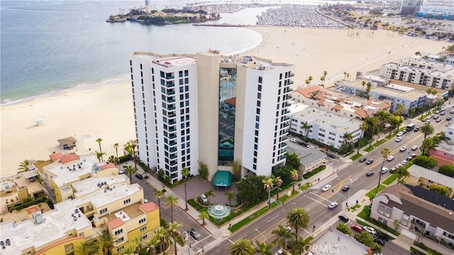 aerial view with a beach view and a water view