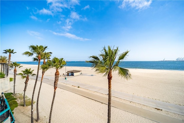 property view of water featuring a beach view