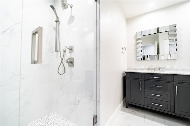 bathroom with vanity and a shower with shower door