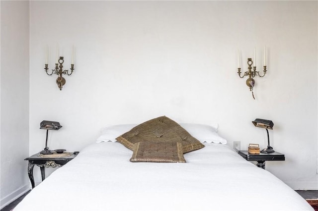 bedroom featuring wood-type flooring