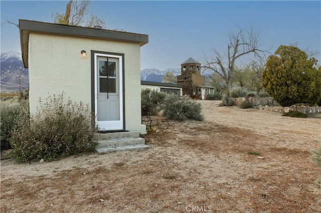 view of outdoor structure with a mountain view