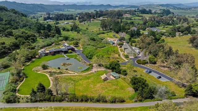 aerial view with a water and mountain view