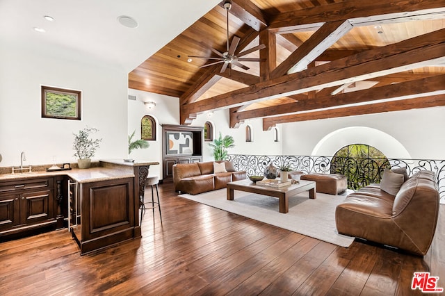 living room with wood ceiling, ceiling fan, hardwood / wood-style flooring, and beamed ceiling