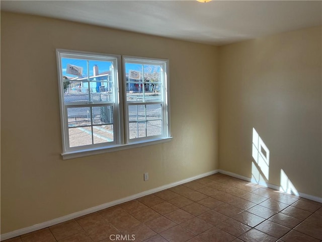 view of tiled empty room