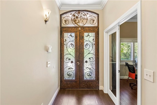 entryway with french doors, dark hardwood / wood-style floors, and crown molding