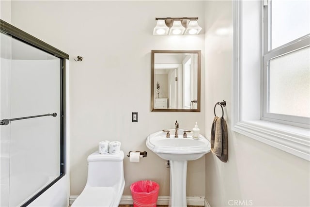 bathroom with  shower combination and toilet