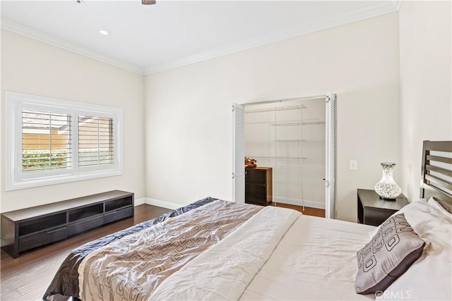 bedroom featuring dark hardwood / wood-style floors and crown molding