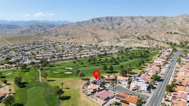 bird's eye view with a mountain view