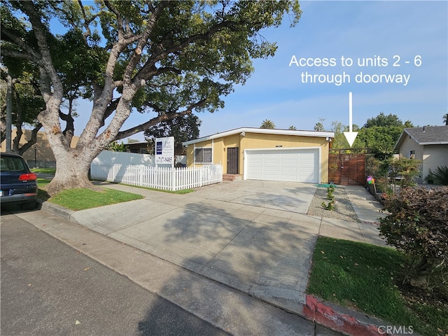 ranch-style house featuring a garage