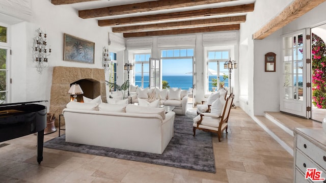 living room featuring french doors, beamed ceiling, light tile floors, and a water view