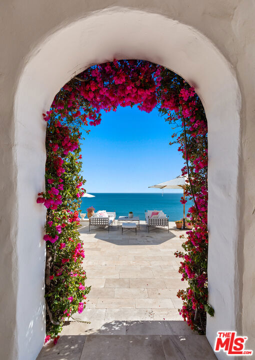 view of patio featuring a water view