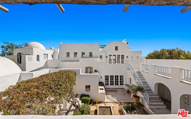 view of front of property featuring a patio area