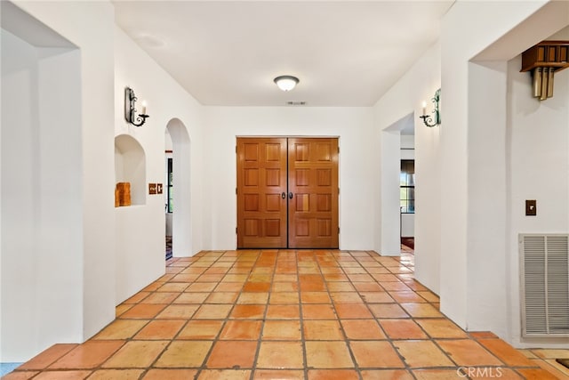 view of tiled foyer entrance