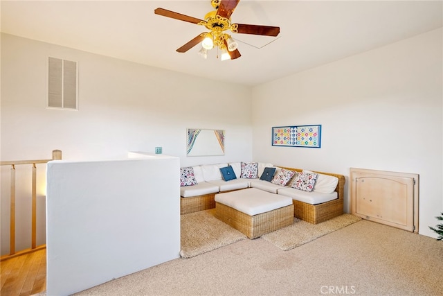 unfurnished living room featuring hardwood / wood-style flooring and ceiling fan