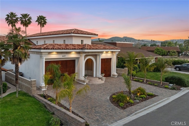 mediterranean / spanish-style house featuring a mountain view