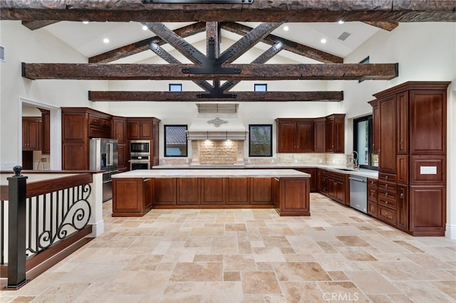 kitchen featuring appliances with stainless steel finishes, high vaulted ceiling, light tile flooring, tasteful backsplash, and island exhaust hood