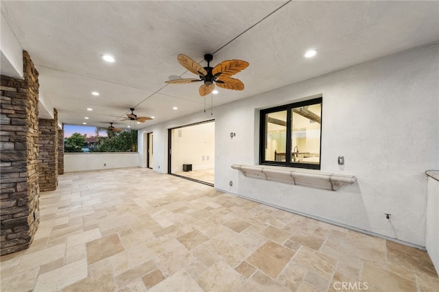 view of patio / terrace with ceiling fan