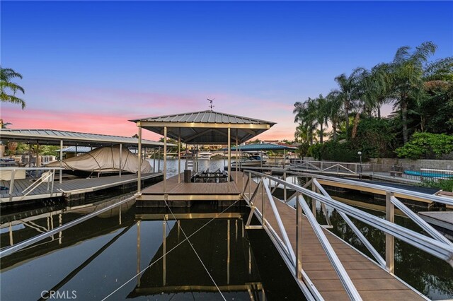 dock area featuring a water view