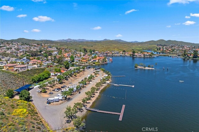 bird's eye view featuring a water and mountain view