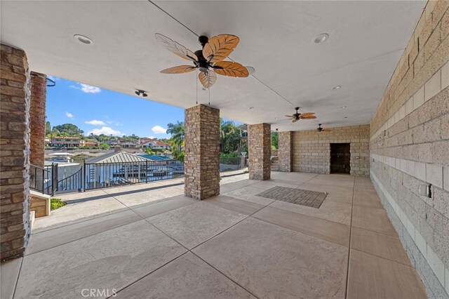 view of patio featuring ceiling fan